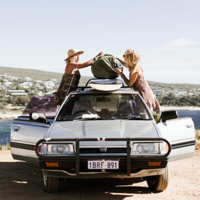 Women packing up a car A Handy Guide To Successful Outings